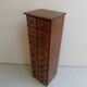 Antique oak apothecary cabinet with drawers