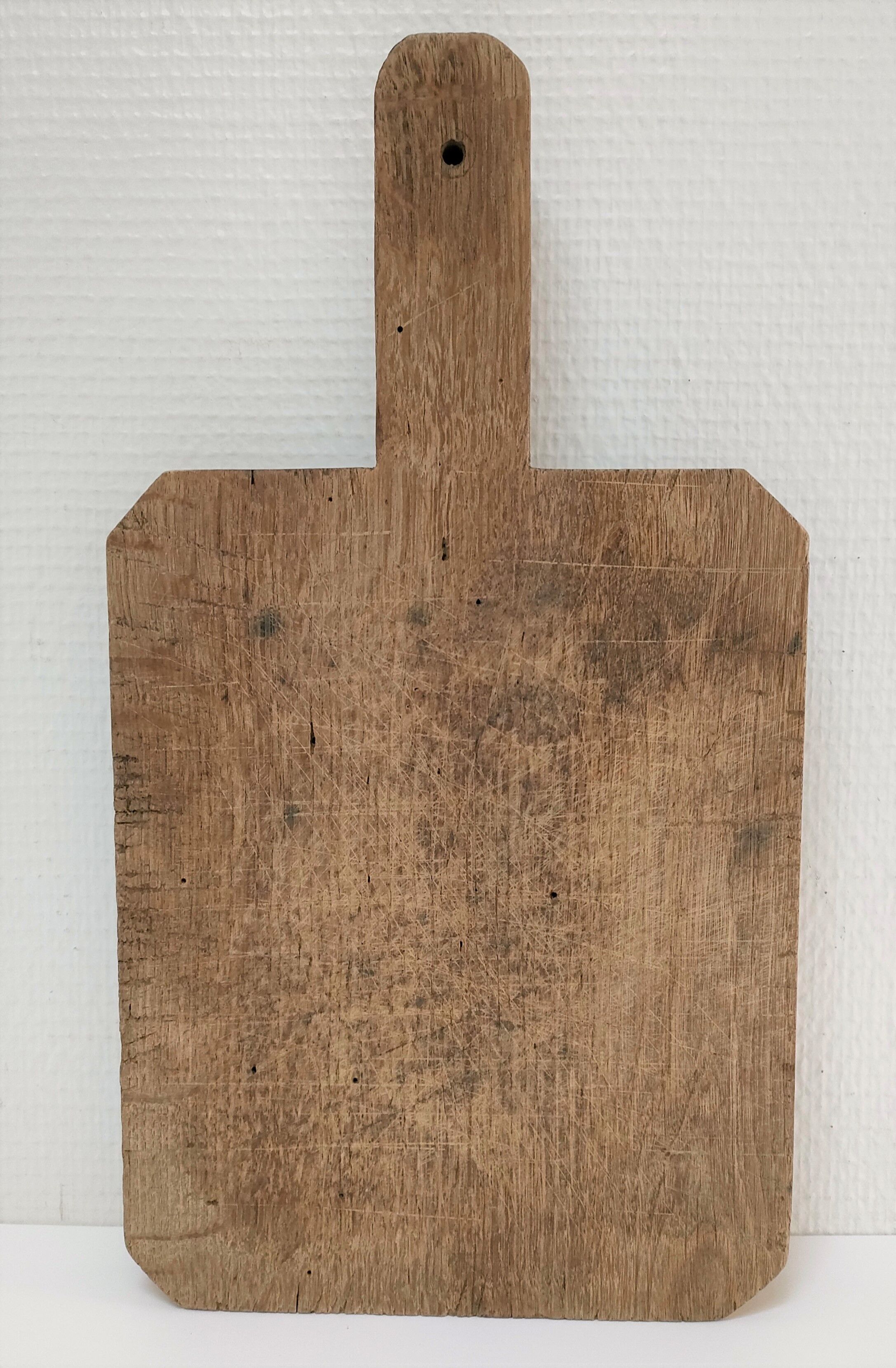 Vintage patinated solid wood cutting board H. 41 cm