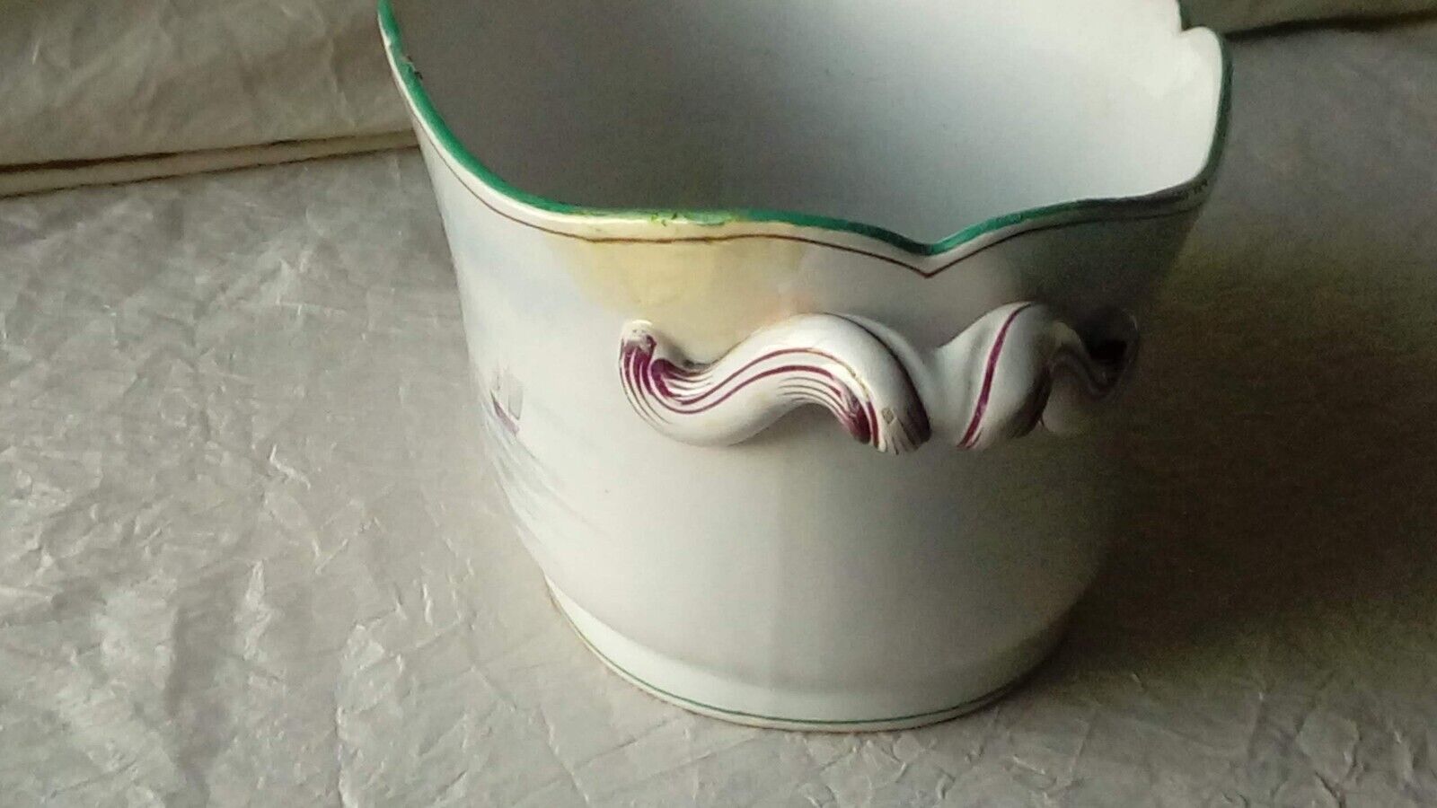 St Clement faience jardiniere with marine and swan decoration, early 20th century.