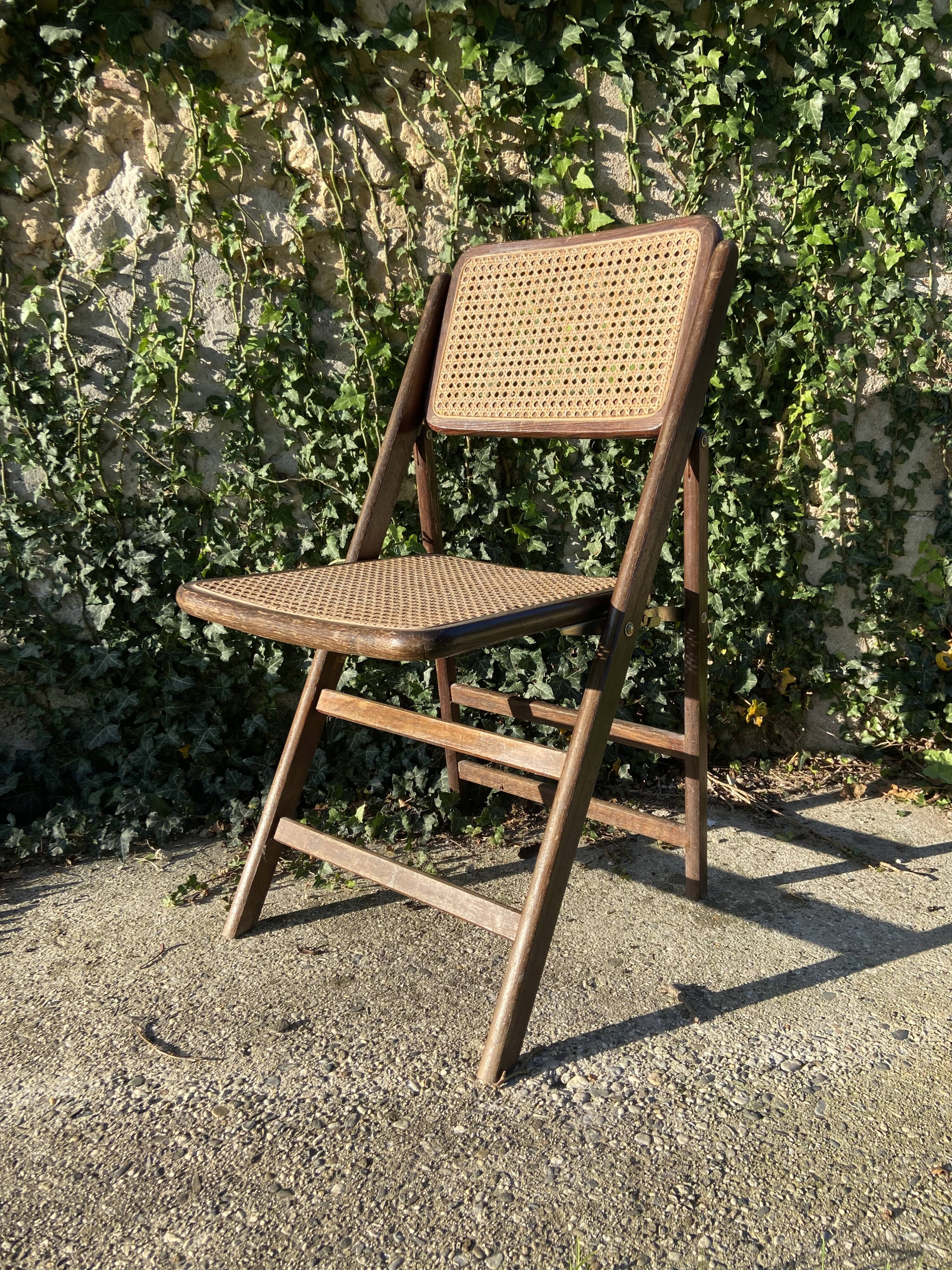 Folding chair in wood and cane.