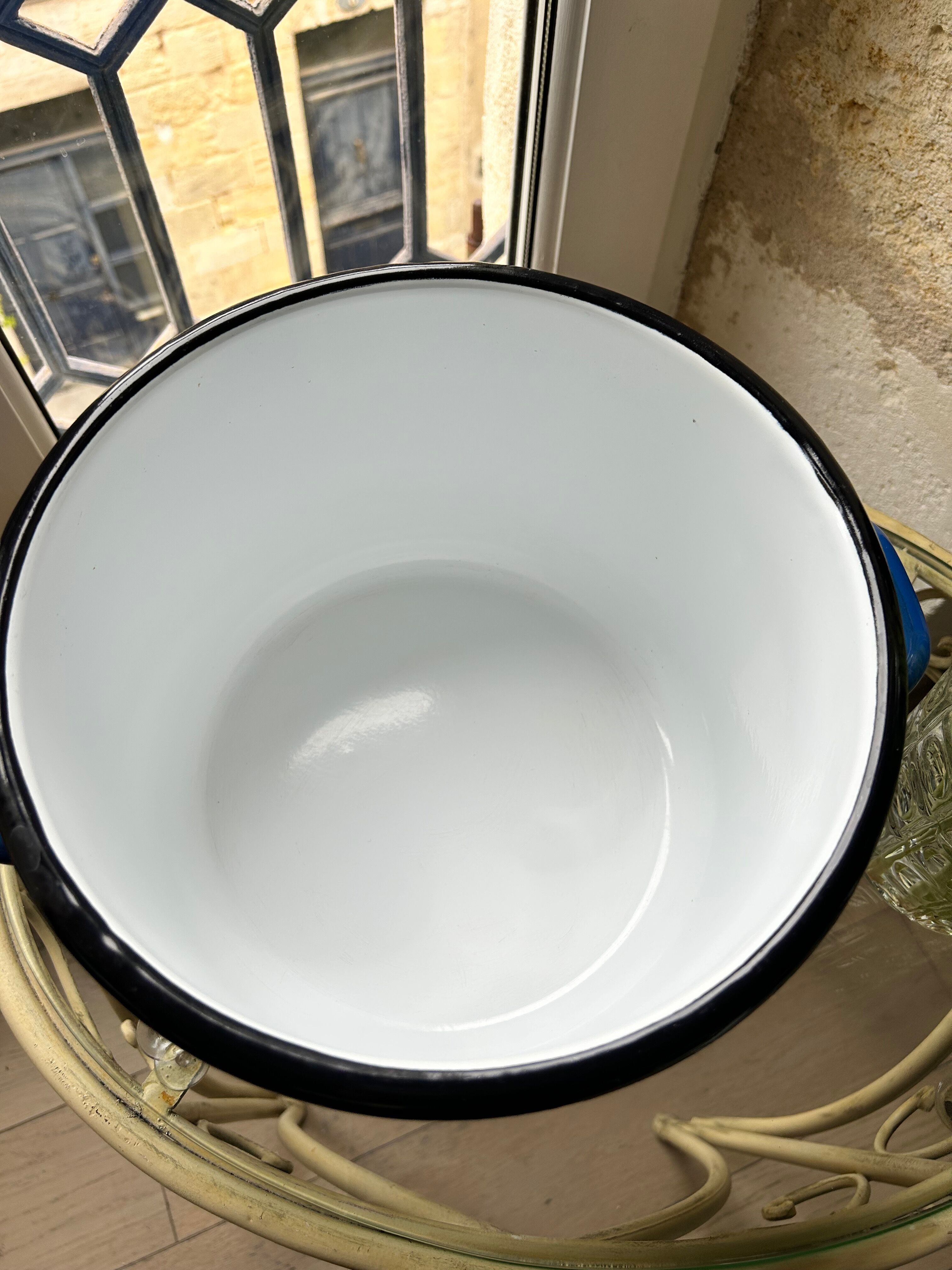 Vintage pot in enamelled sheet metal