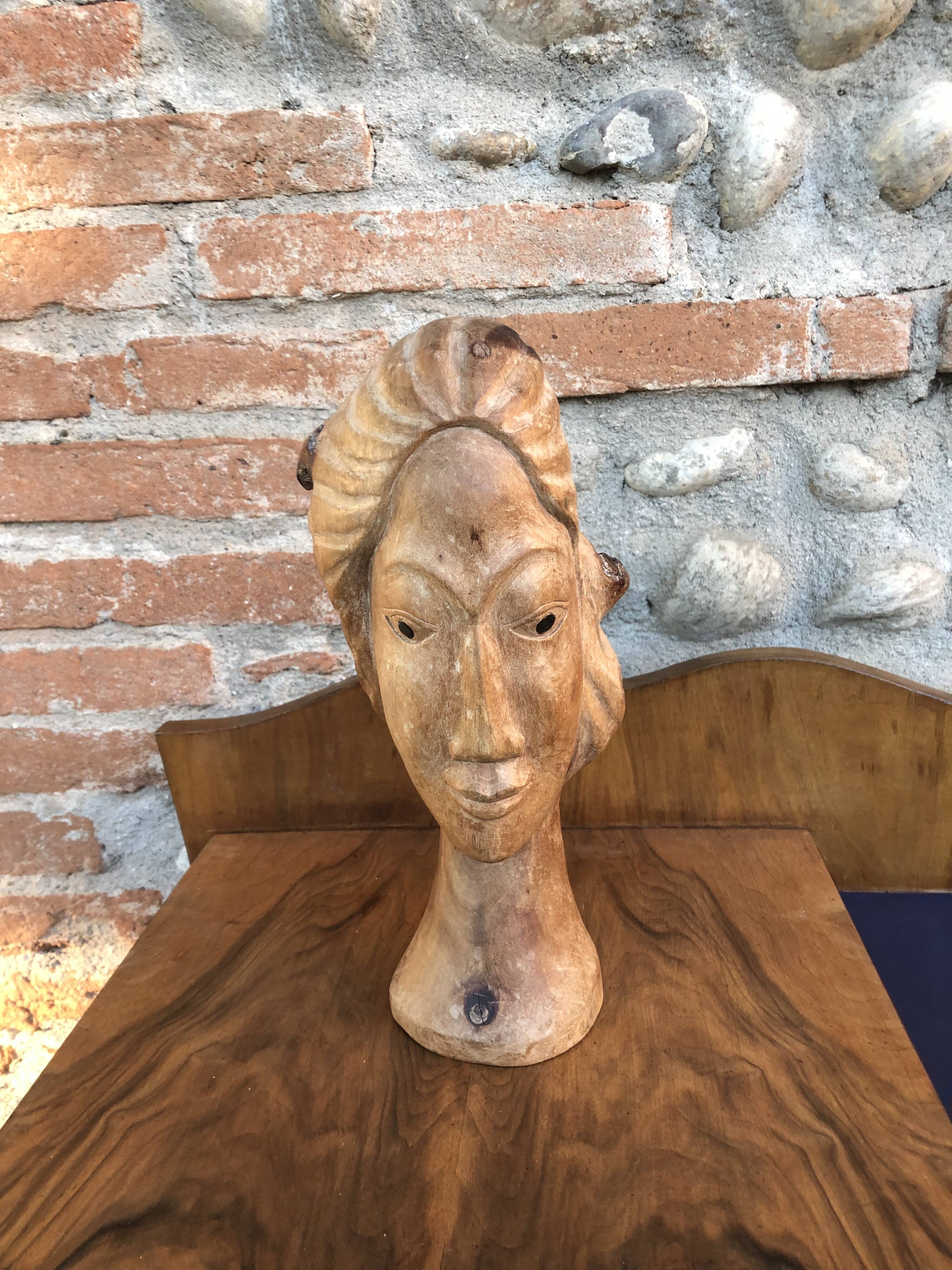 Wood head sculpture