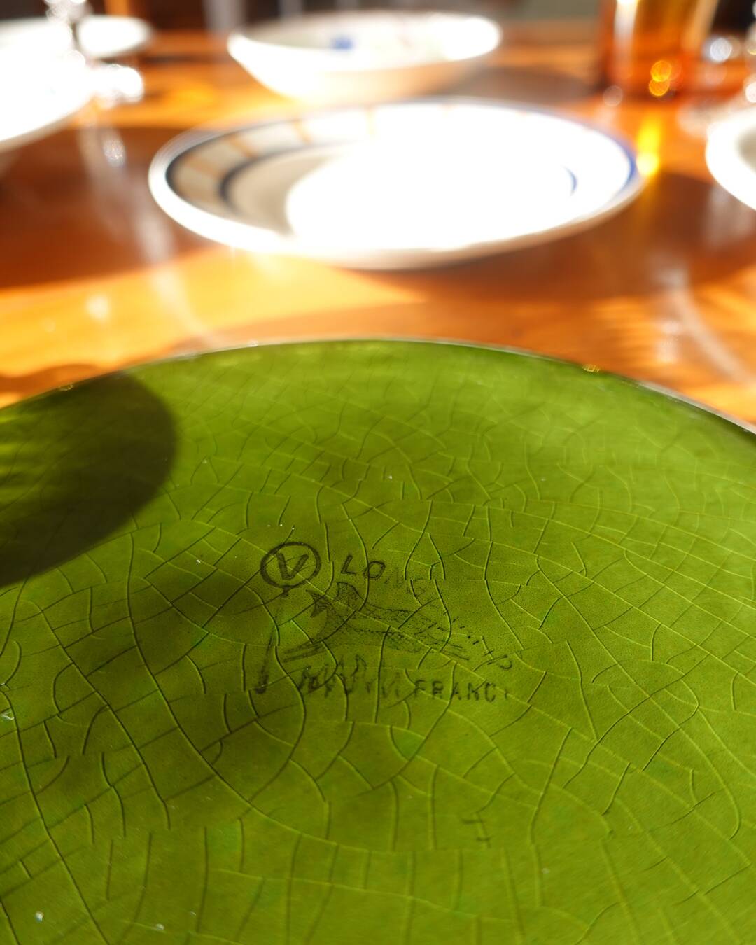 5 plates, mismatched dishes