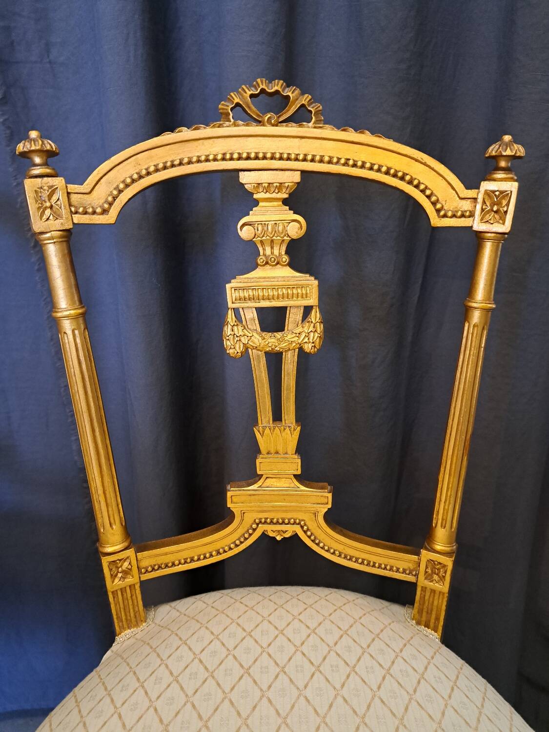 Pair of Napoleon III chairs in gilded wood