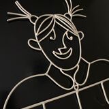 Pair of iron coat holders girl and boy