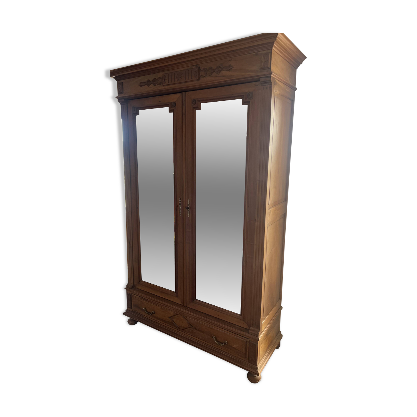 Walnut wardrobe with mirror doors.