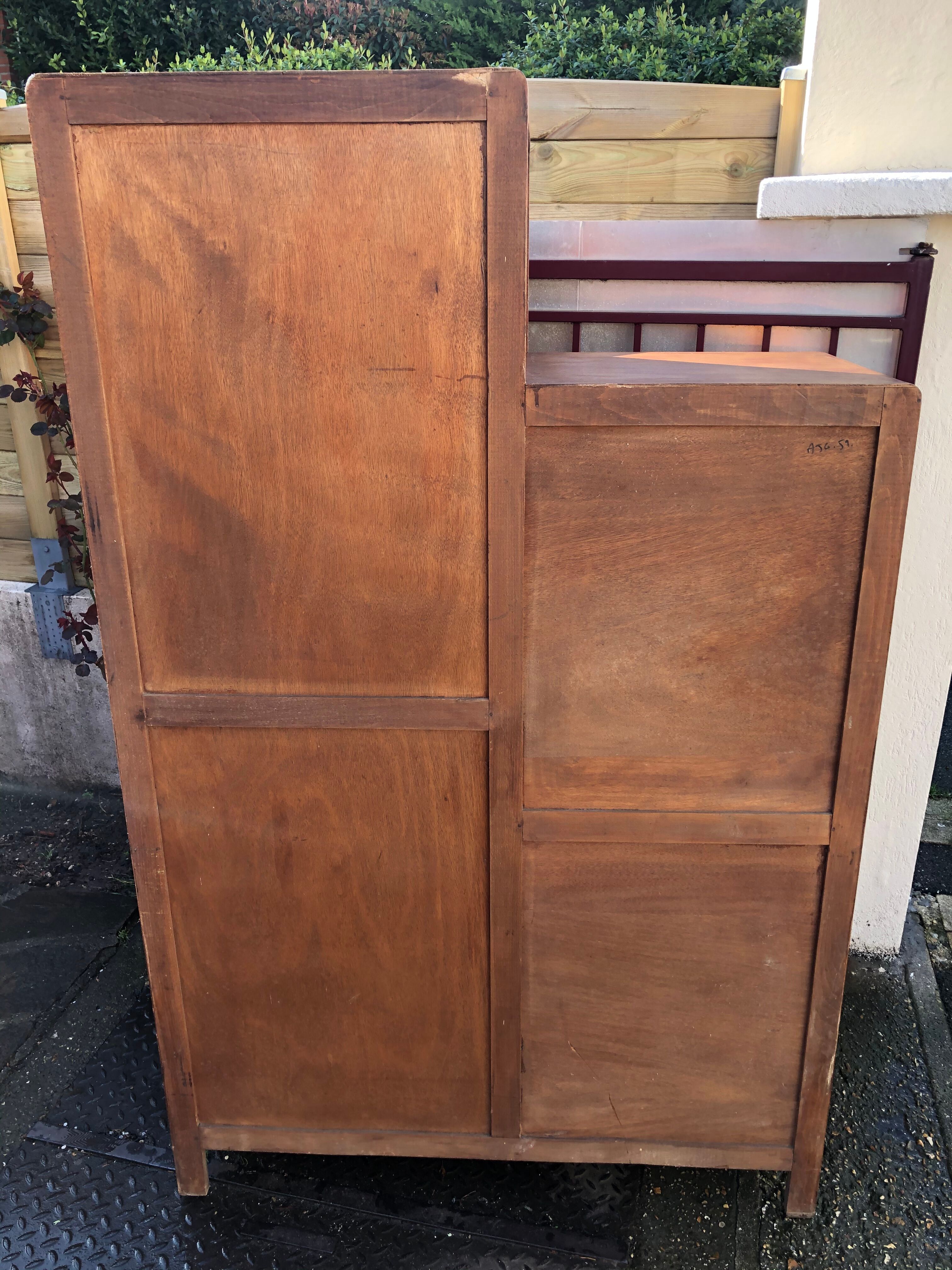 Asymmetrical cabinet