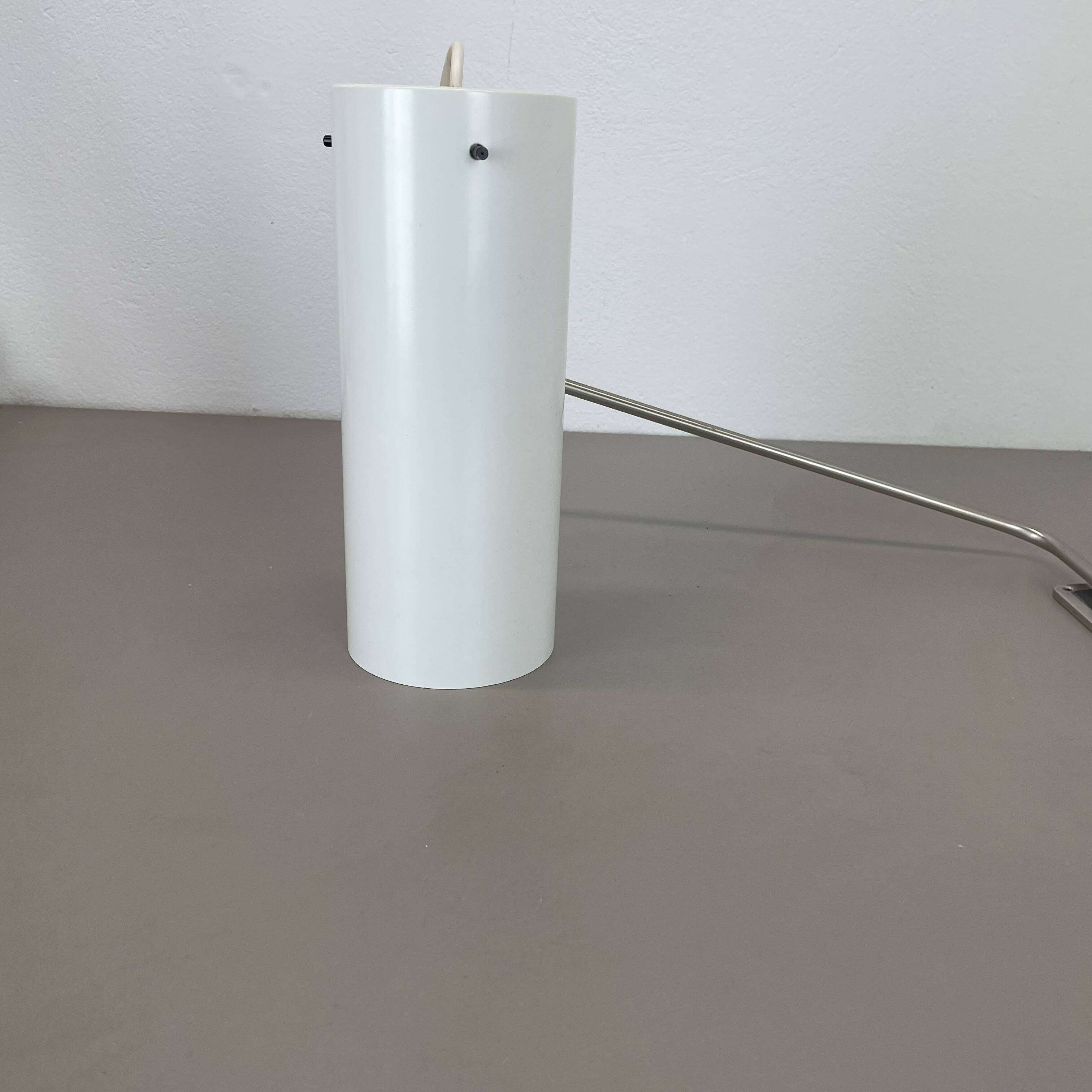 Minimalist Adjustable Swing Arm metal Wall Light with white shade, Germany