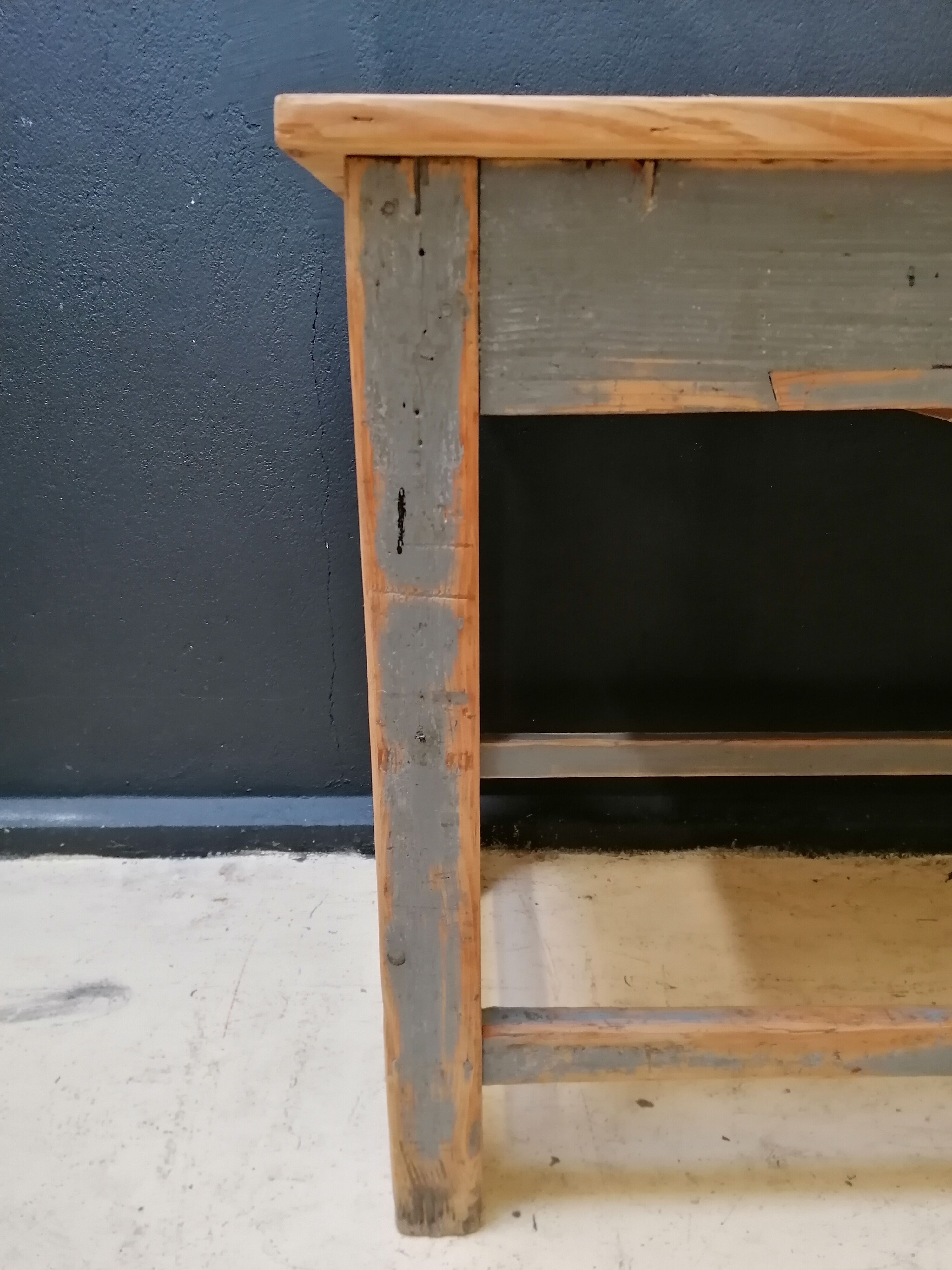 Patinated drapery table