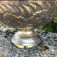 Large silver plated champagne cooler bowl on pedestal with grape