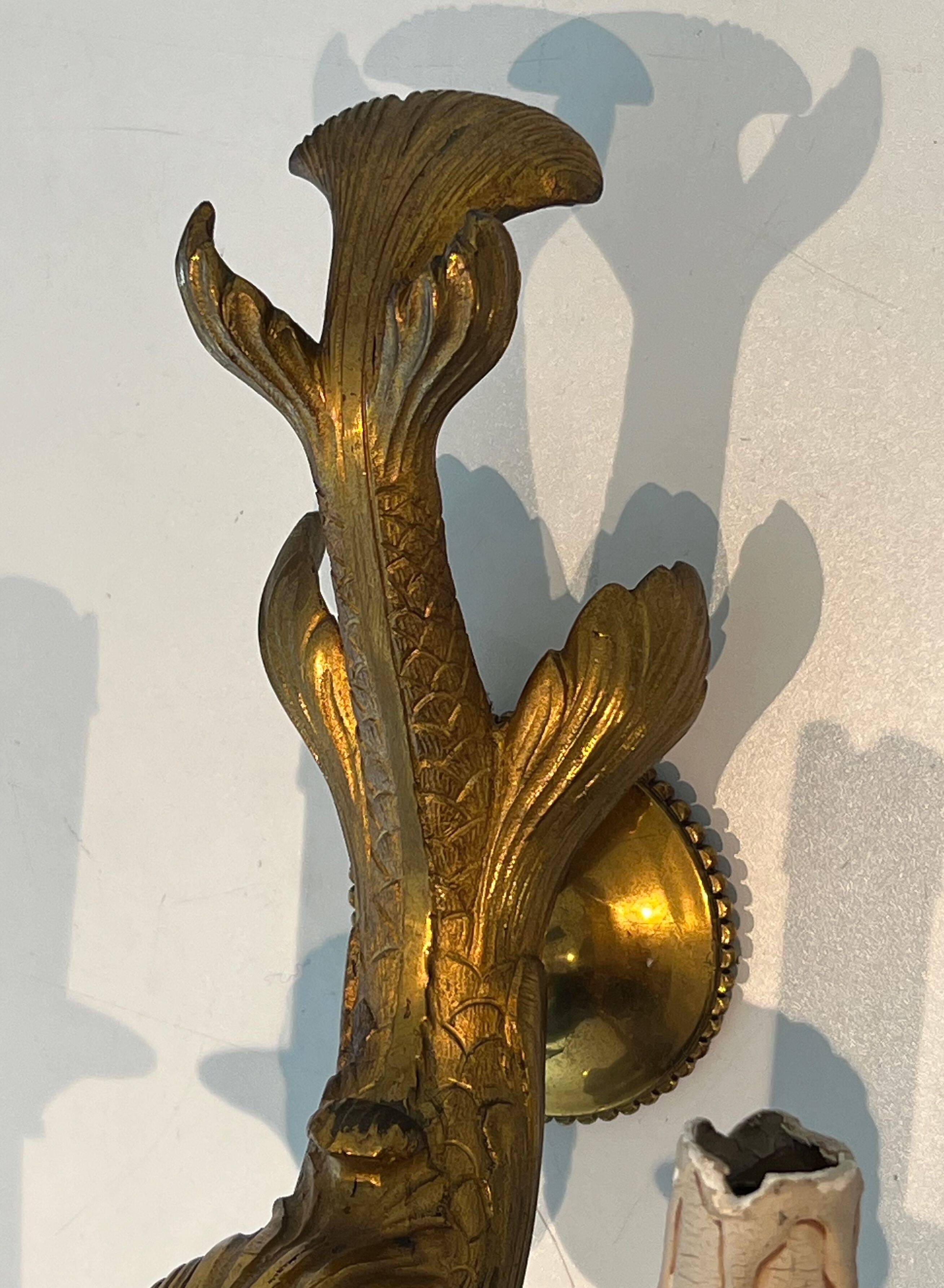 Pair of bronze wall sconces with dolphins by Maison Jansen