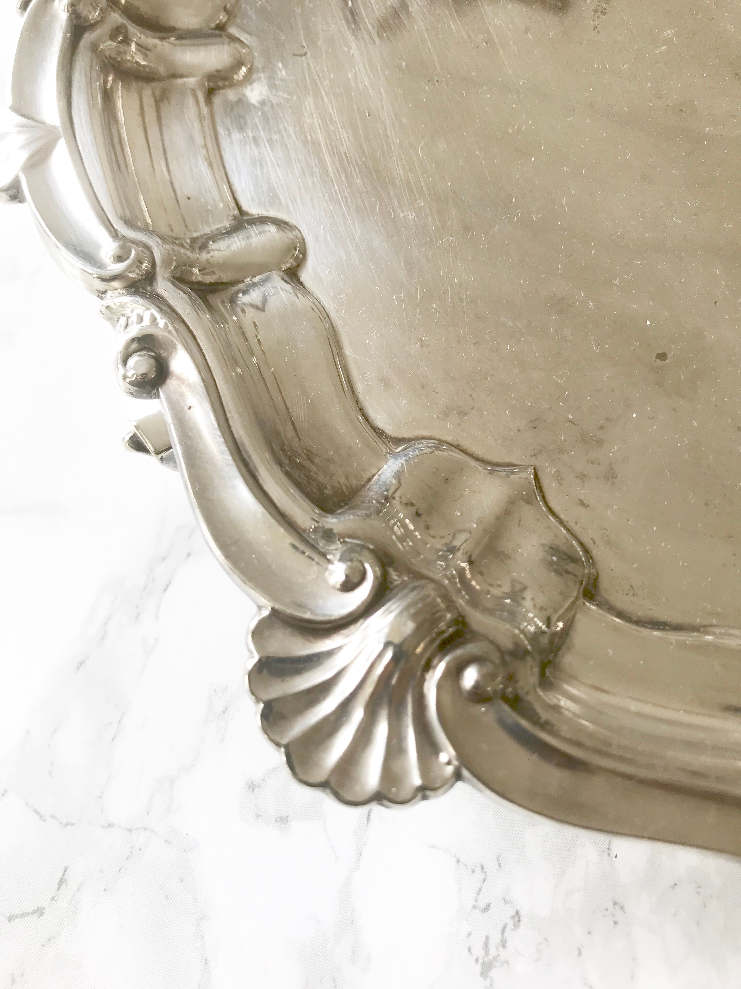 Antique silver metal platter with rockery décor