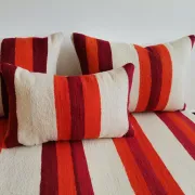 Set of covers for cream and red Moroccan floor sofa.