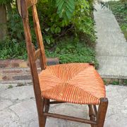 Pair of straw seated chairs