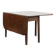 Charming antique English drop-leaf dining table made of oak from the late 19th century