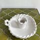 Hand-held candle holder with braided ceramic bowl