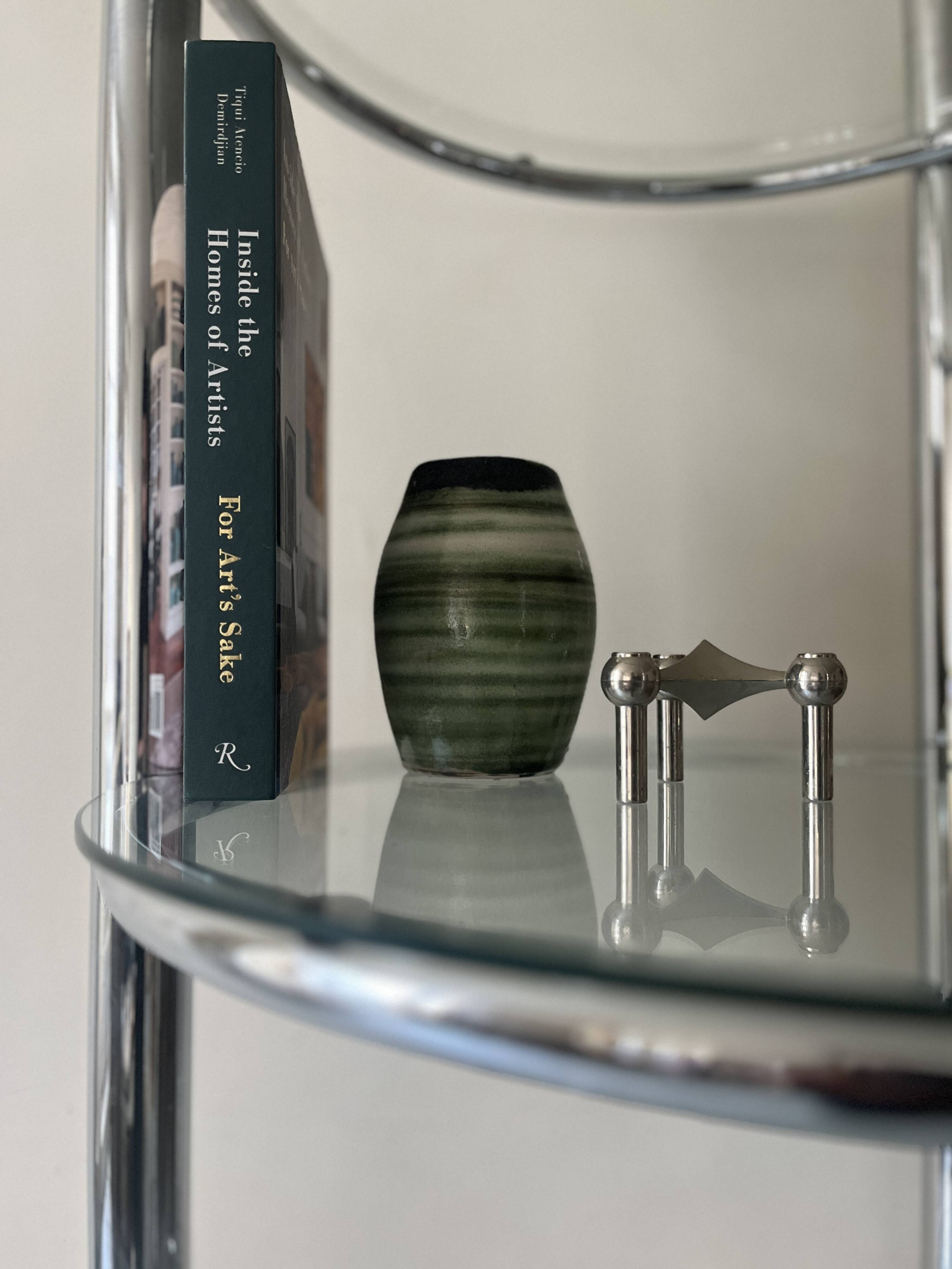 Round tubular bookcase in chrome and glass, 1970 design