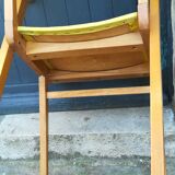 Chair wood and yellow vinyl
