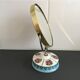 Double round mirror on porcelain foot 15x19cm