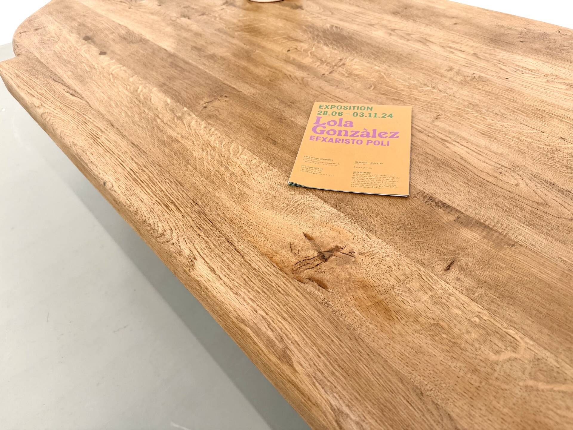 XXL oval coffee table in solid oak, cylindrical base, 1950s.