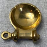 Brass ashtray in the shape of a boat shackle