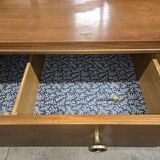 According to André Arbus, a sideboard in a row from the Art Deco period in blonde mahogany.