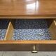 According to André Arbus, a sideboard in a row from the Art Deco period in blonde mahogany.
