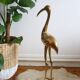 Great brass heron