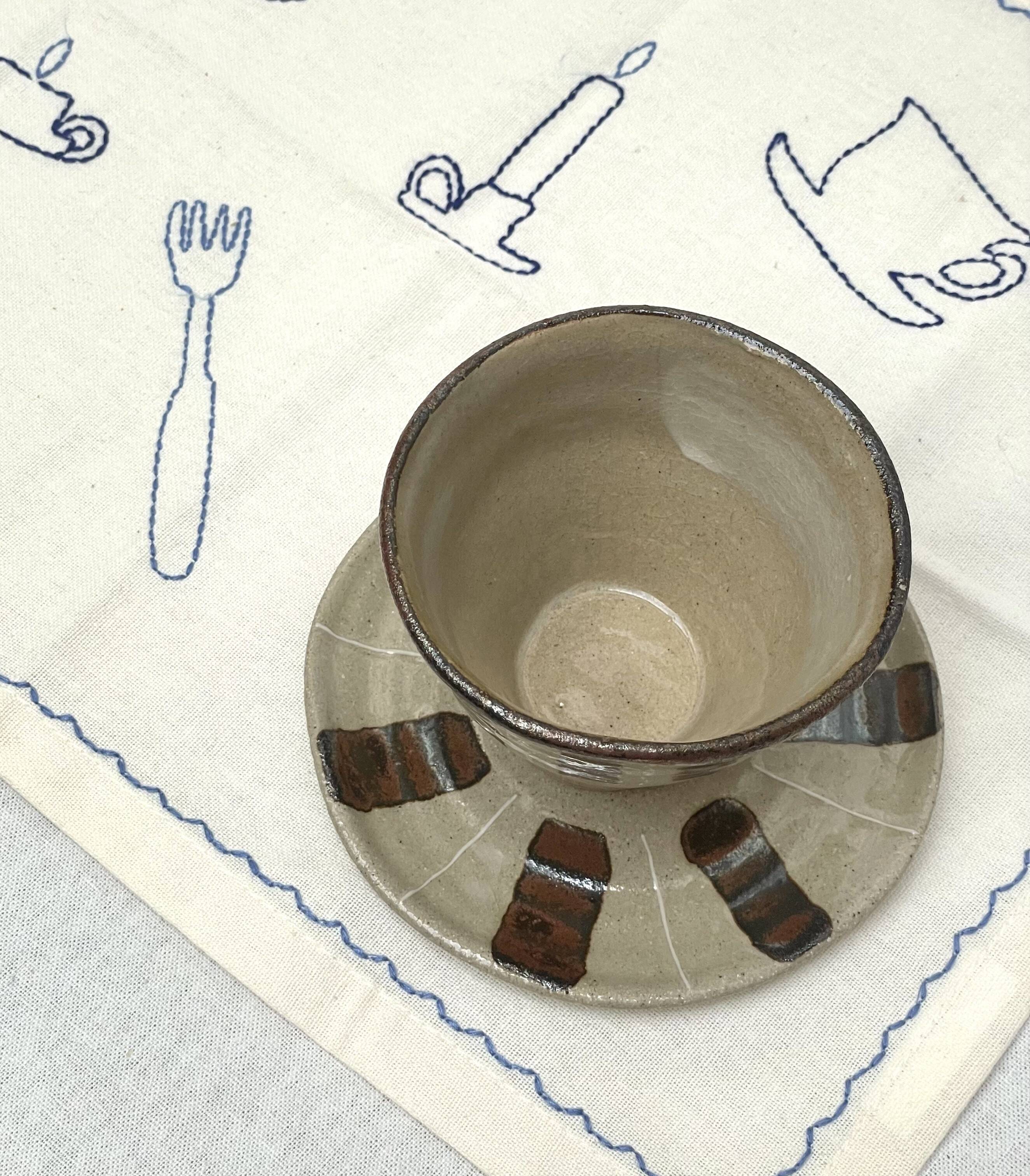Stoneware cup and saucer