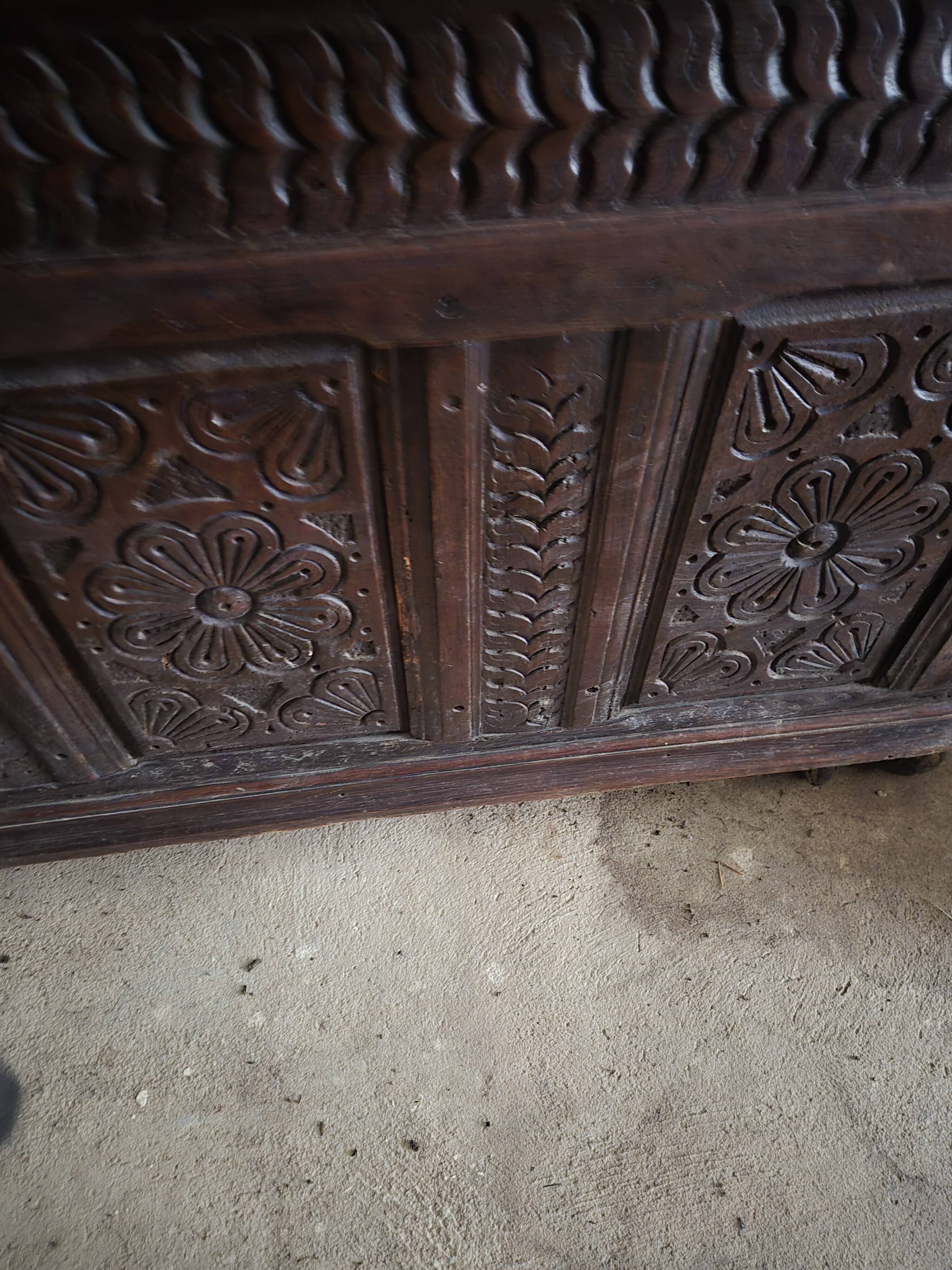 Large carved oak chest from the 17th century.