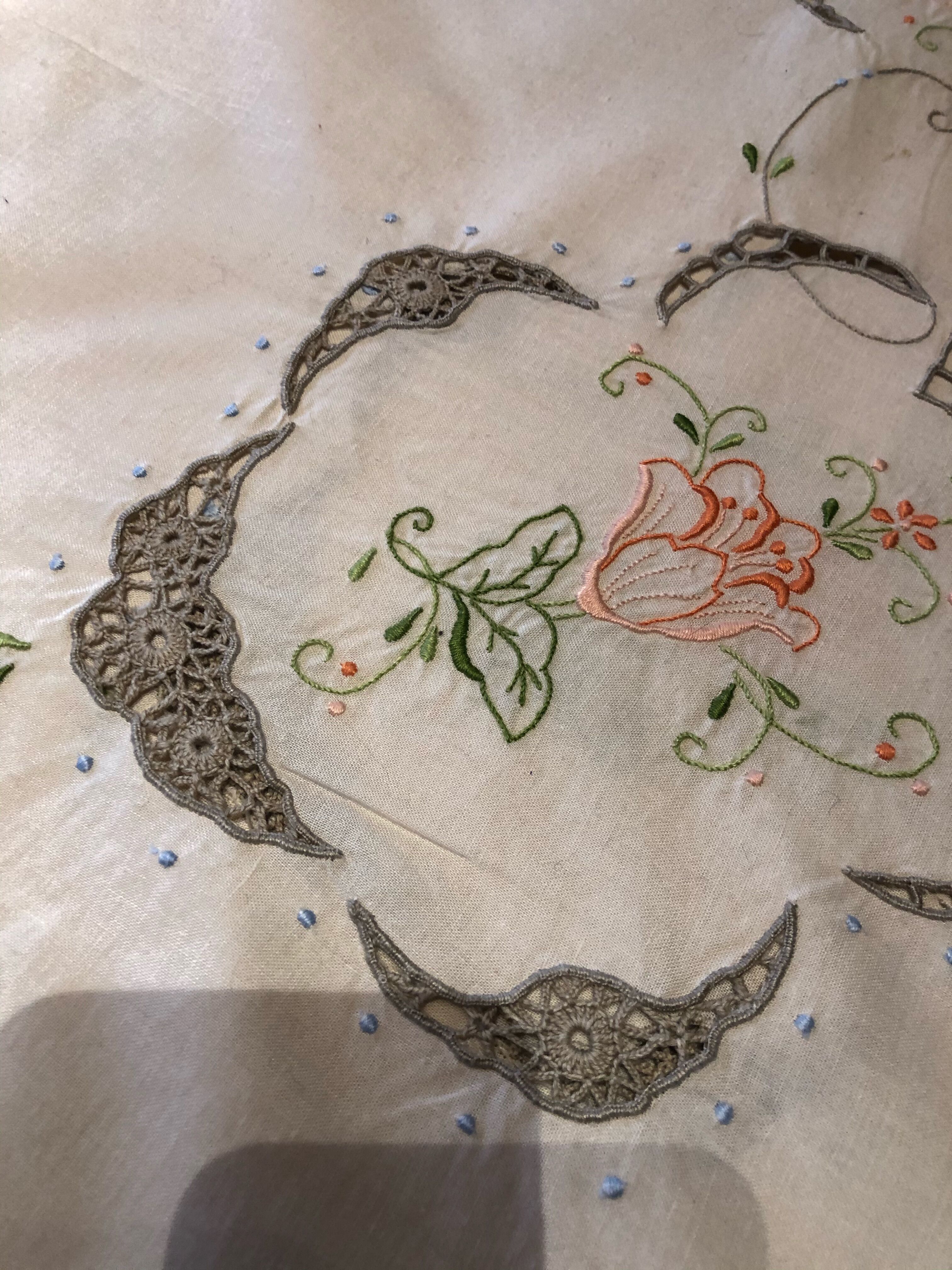 Hand embroidered coat ofkin and old guipure lace