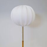 Mid-century floor lamp in brass and oak by Falkenbergs Belysning, Sweden, 1960s.