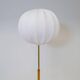 Mid-century floor lamp in brass and oak by Falkenbergs Belysning, Sweden, 1960s.