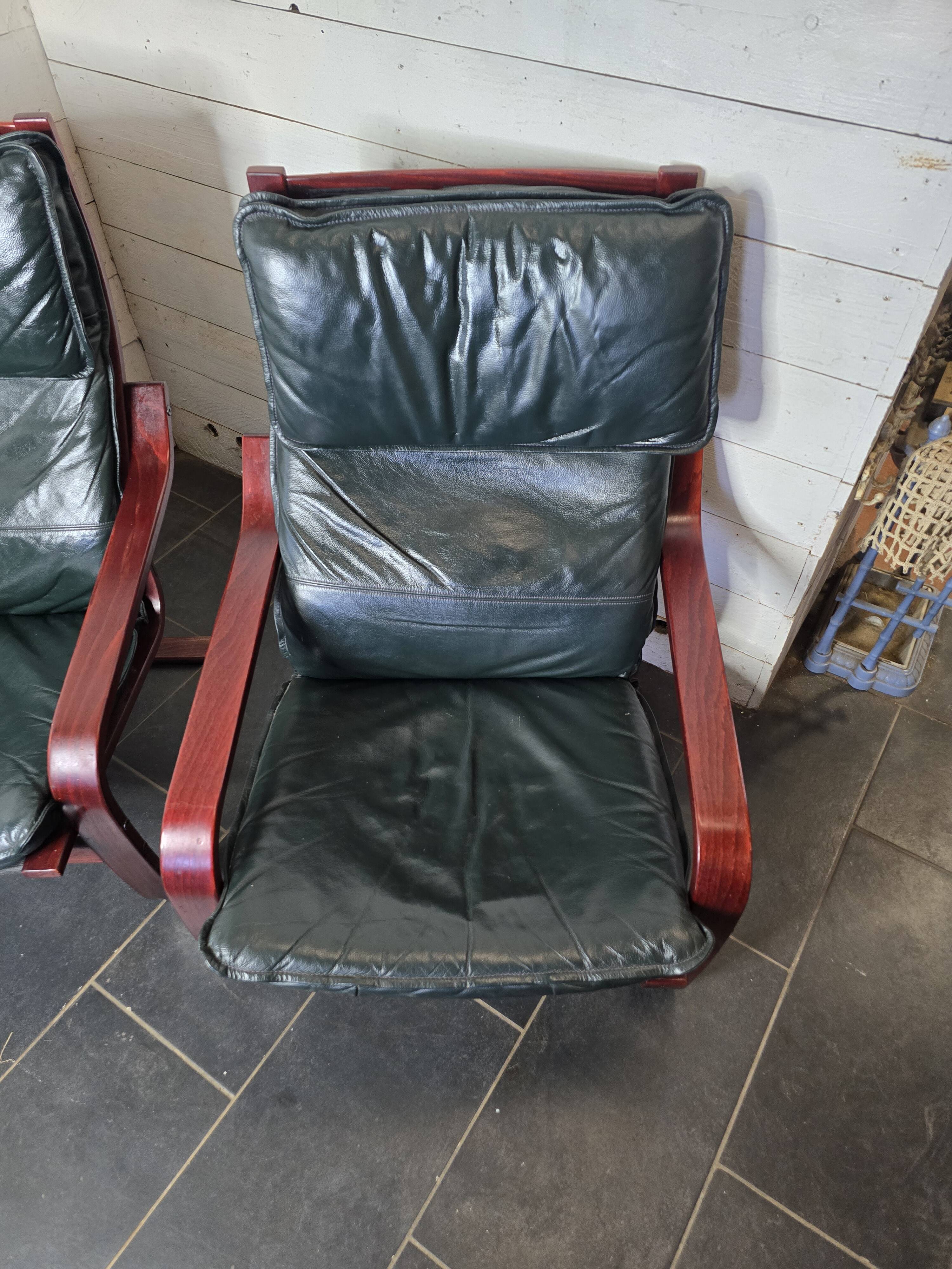 Pair of Scandinavian armchairs in leather and curved wood