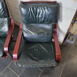 Pair of Scandinavian armchairs in leather and curved wood