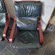 Pair of Scandinavian armchairs in leather and curved wood