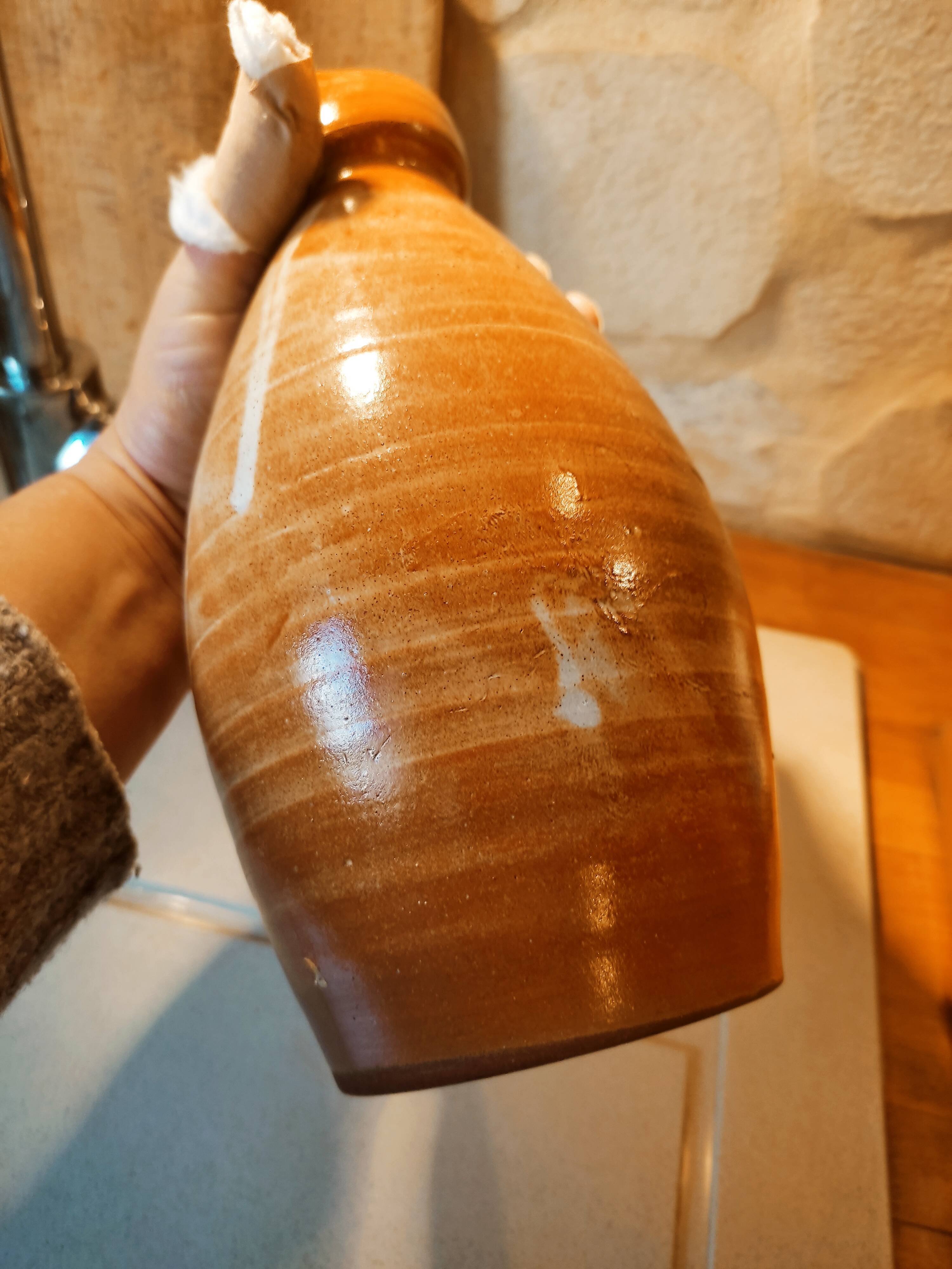 Duo of pitchers water, wine