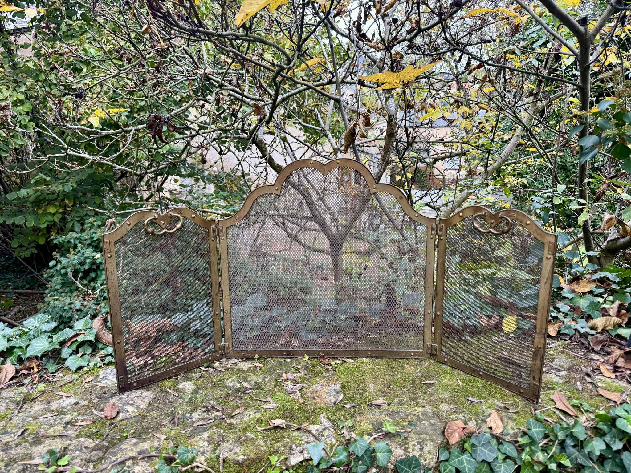 Antique brass fireplace screen