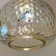 Globe pendant lamp in bubbled amber glass / vintage 60s-70s