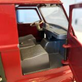 Red Renault estafette guided by a wire