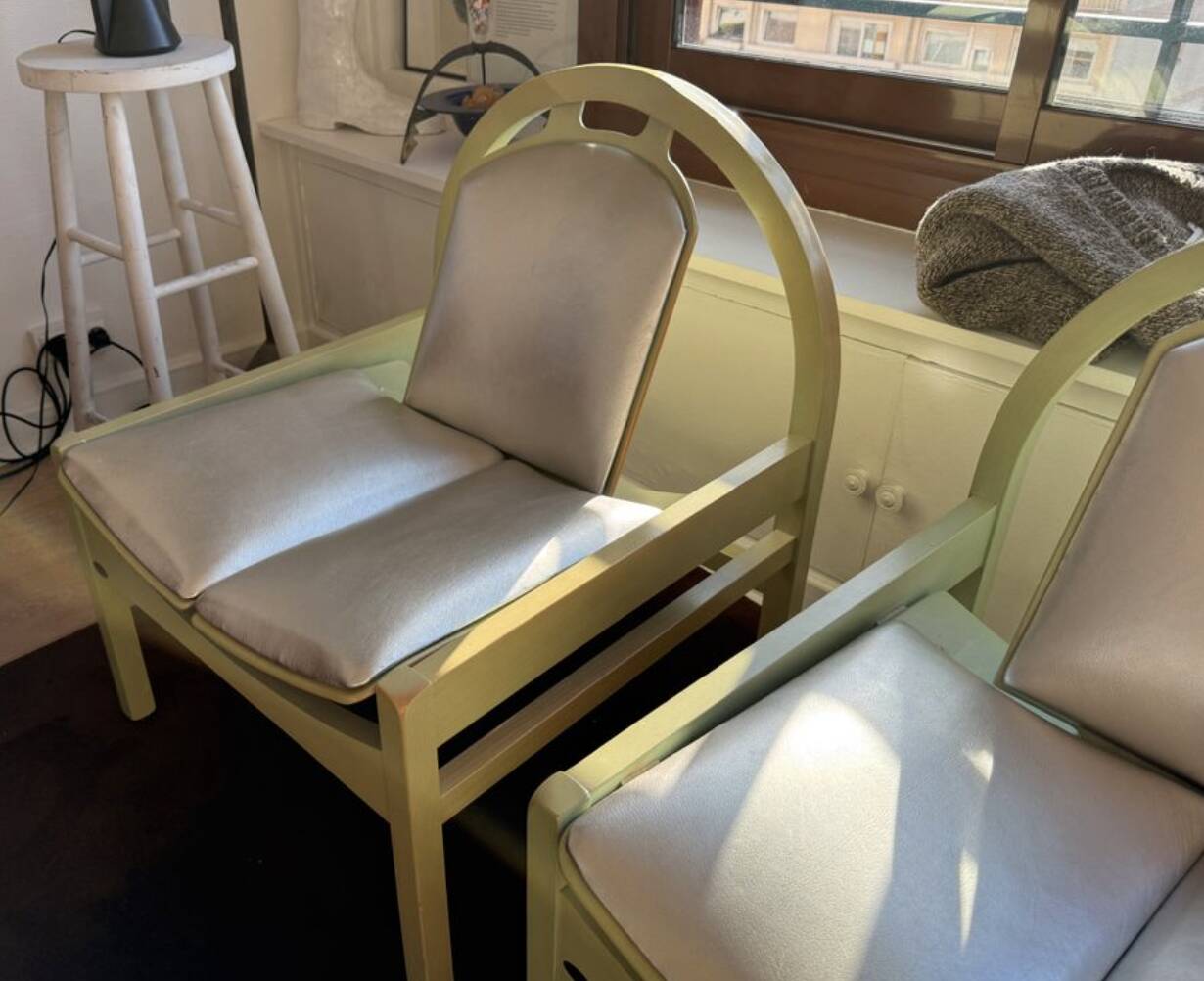 Pair of Argos armchairs by Baumann in green and silver leather.