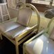 Pair of Argos armchairs by Baumann in green and silver leather.