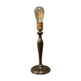 Black table lamp with paint splatters from the 1920s