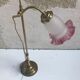 Old brass foot lamp