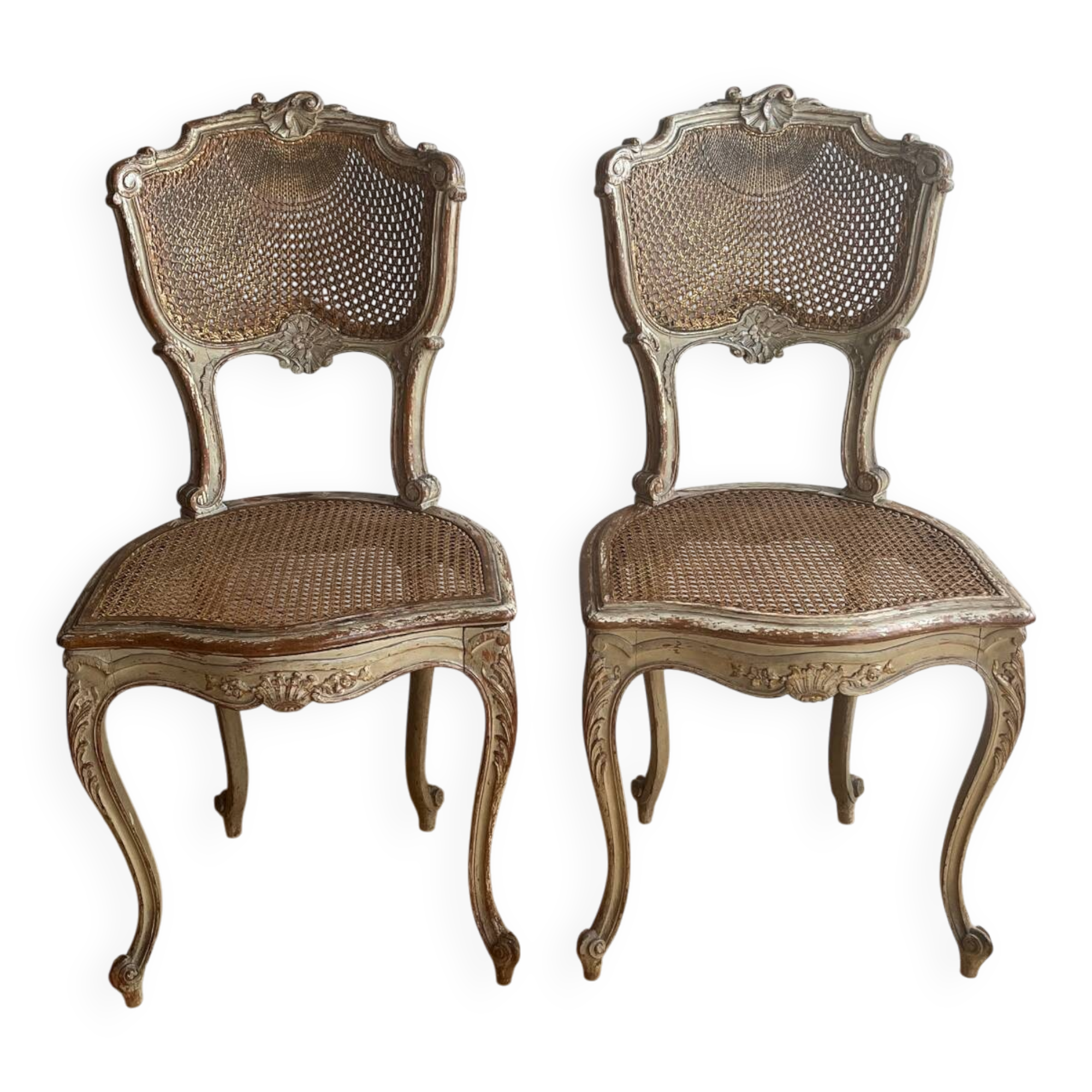 2 caned chairs in Louis XV Regency style