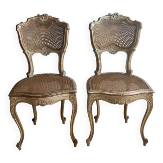2 caned chairs in Louis XV Regency style