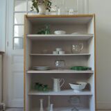 Vintage bookshelf in oak veneer, pearl grey interior, metal legs.