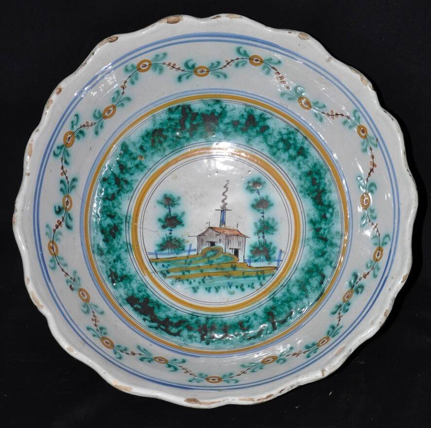 Nevers earthenware dish decorated with a Chinese pagoda, 18th century