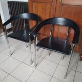 Pair of black and chrome leather Italian armchairs