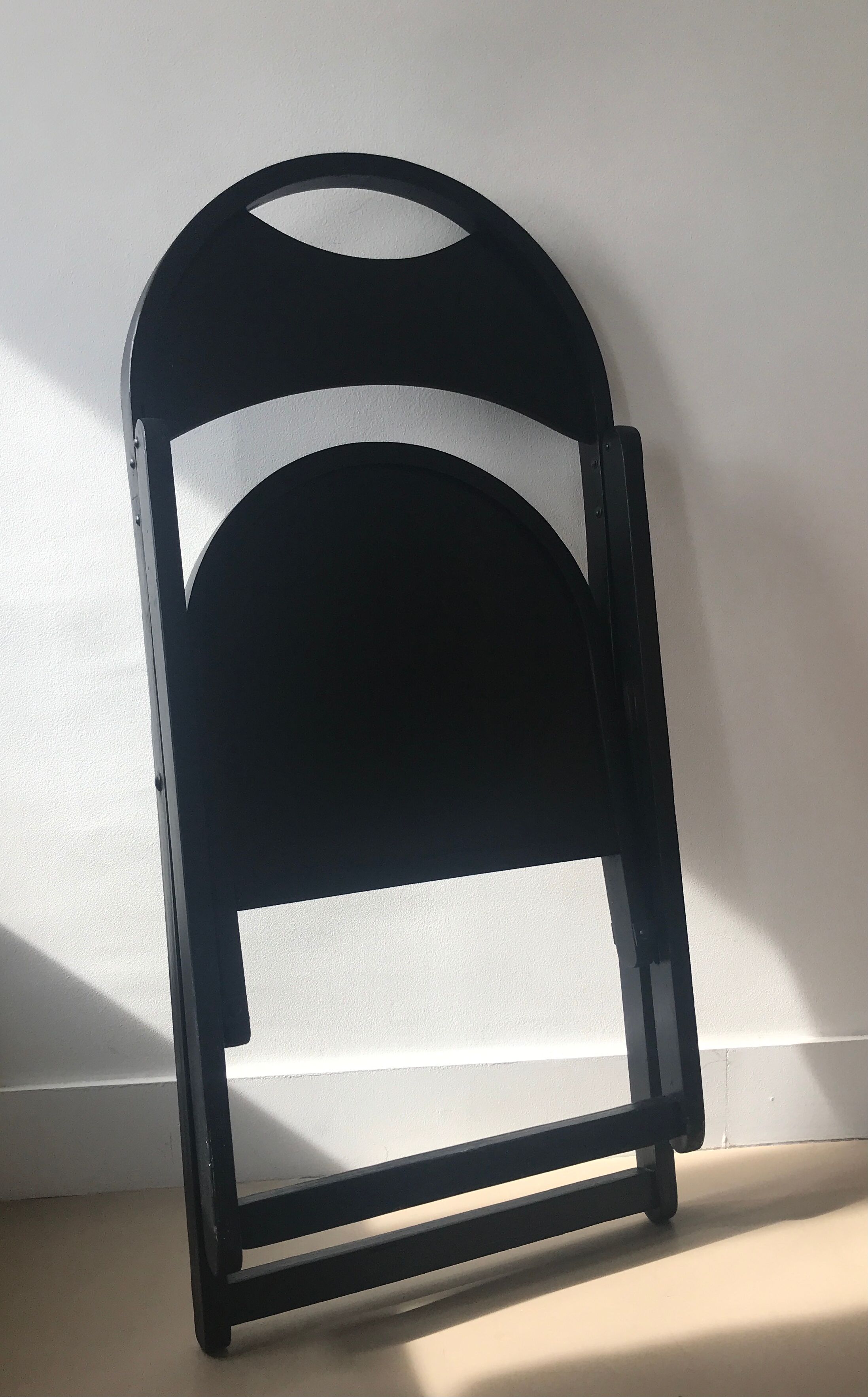 Black folding chair